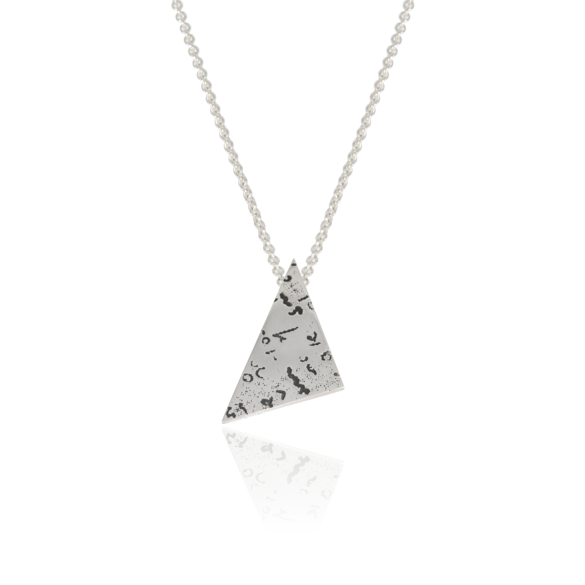 Silver angular pendant with etched and oxidised handwriting